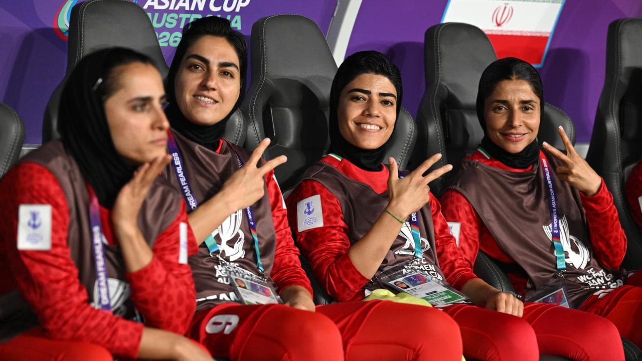 Iranian women's soccer players at an AFC Women’s Asian Cup match