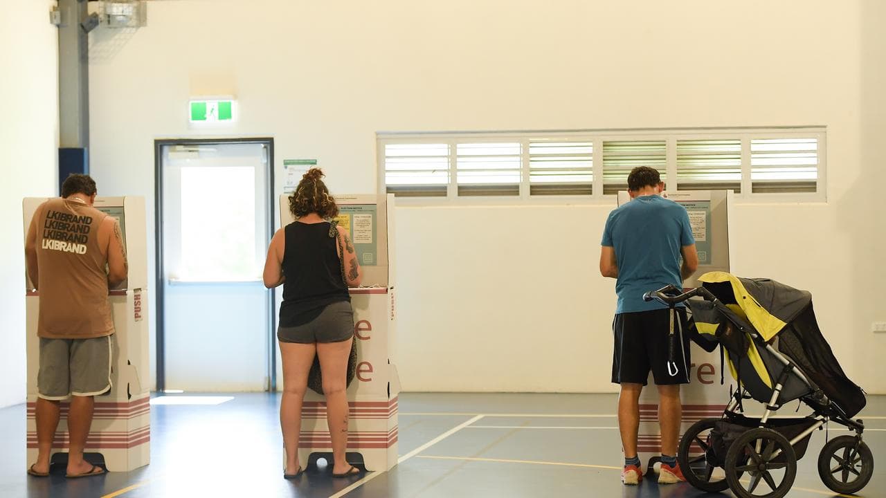 Voters casting their votes in a local election.