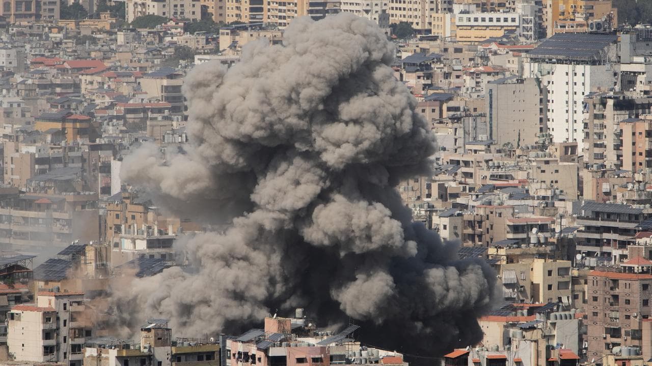 Smoke from a building following an Israeli strike in Dahiyeh, Beirut