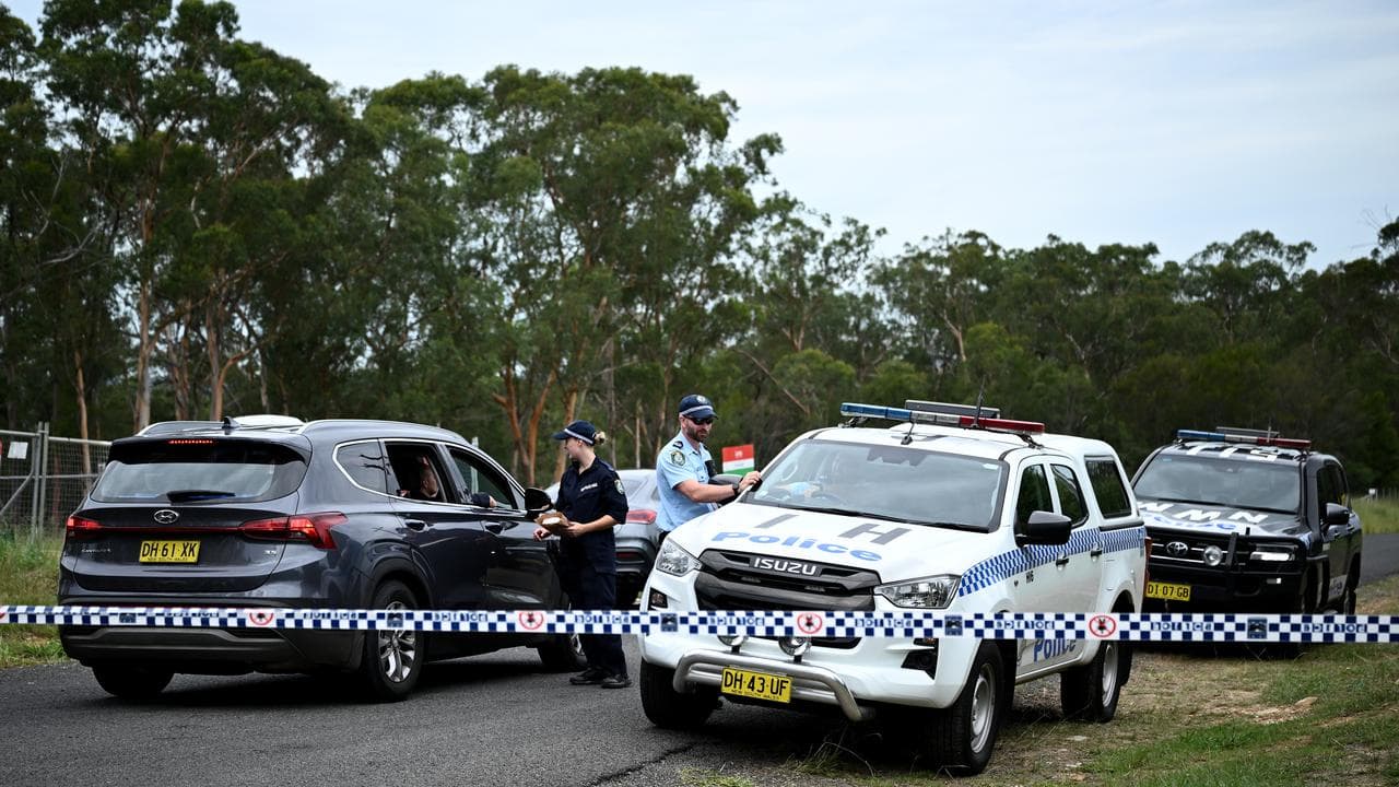 Police search a property