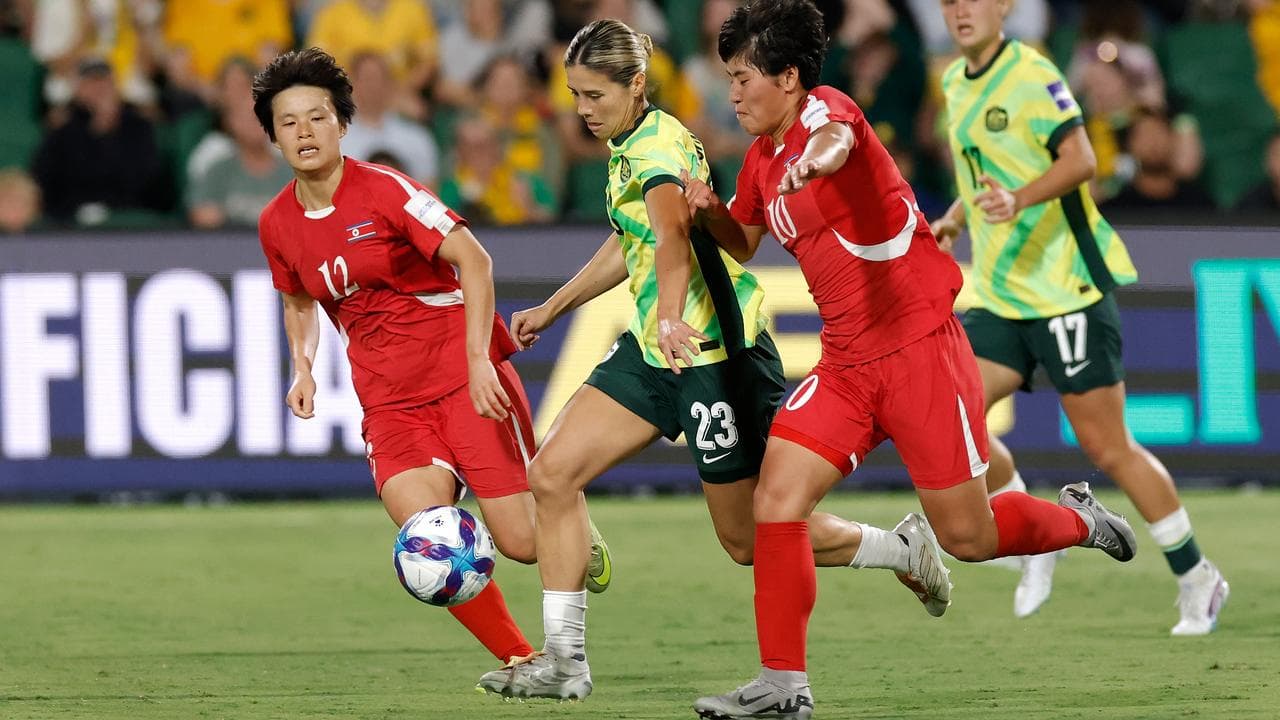 Kyra Cooney-Cross of Australia under pressure from North Korea