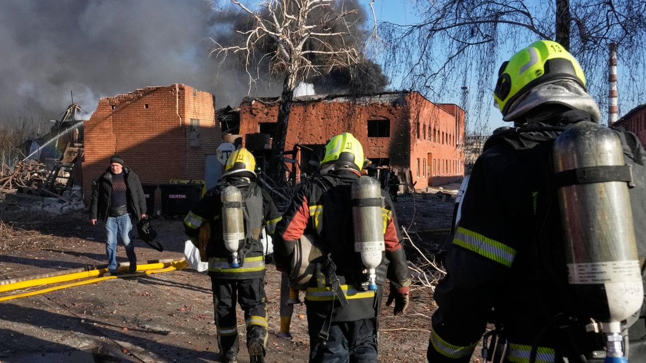 Firefighters after a Russian attack near Kyiv, Ukraine