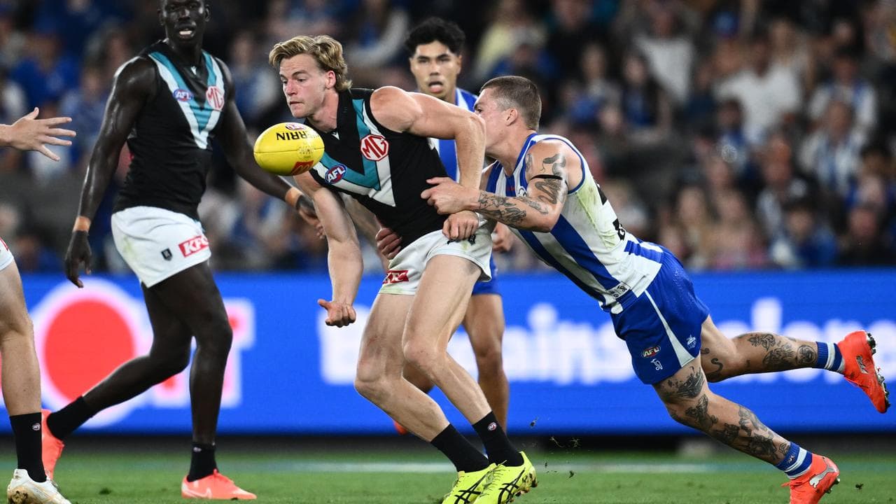 Cameron Zurhaar stops Port Adelaide's Jason Horne-Francis