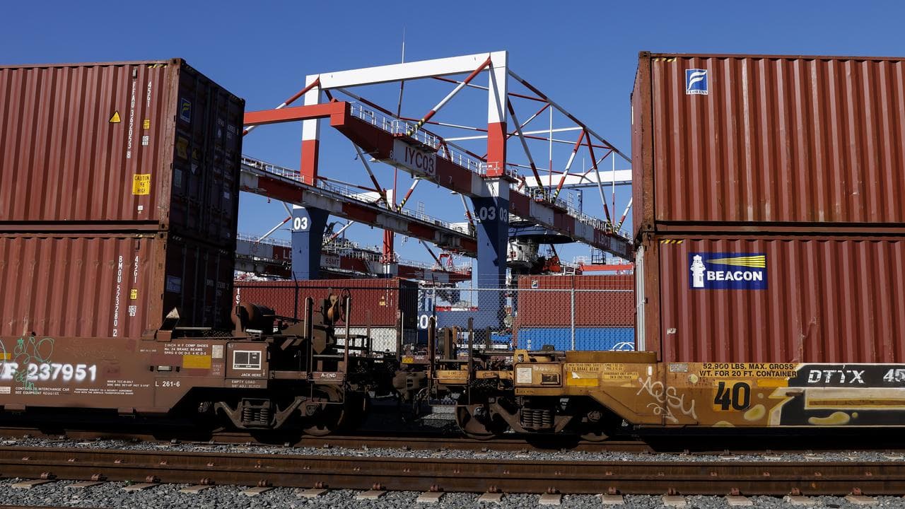 Shipping containers are stacked at the Port of Los Angeles