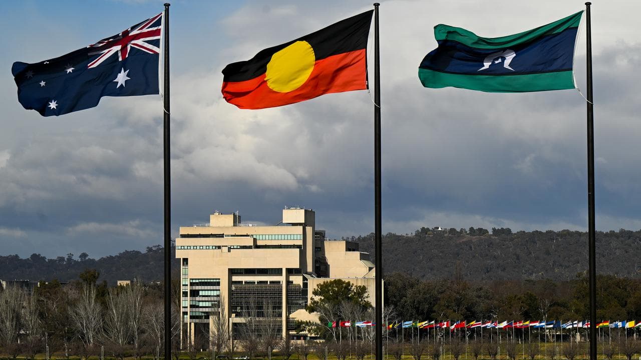 Australian and Indigenous flags in front of High Court (file image)