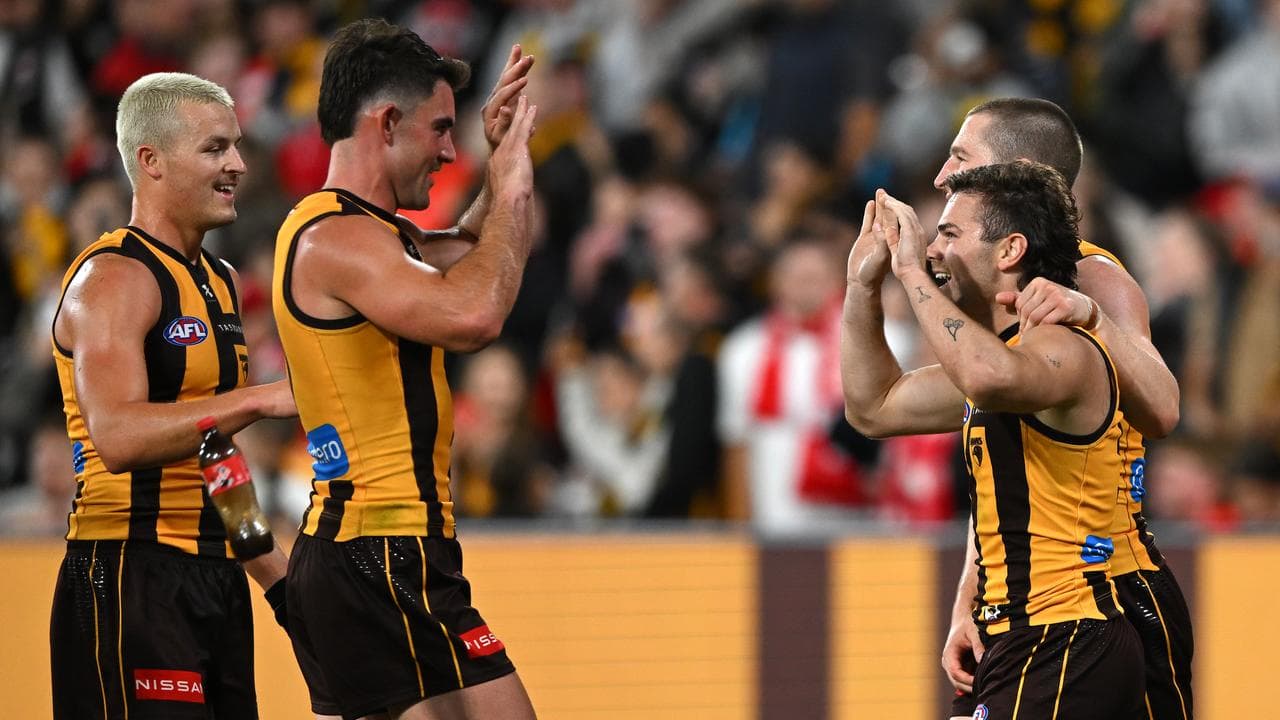 Celebrating Hawthorn players.