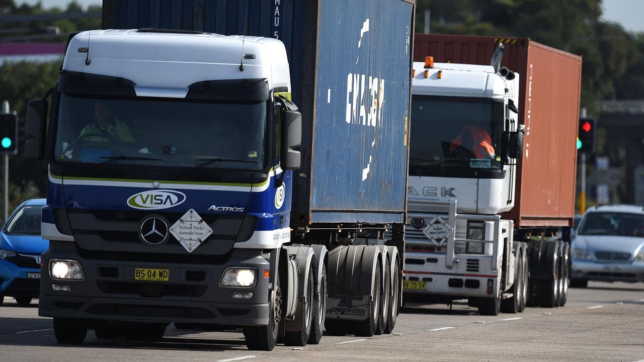 Trucks moving freight containers (file image)