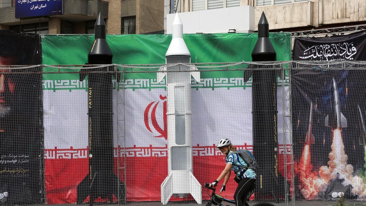 A cyclist in Tehran, Iran