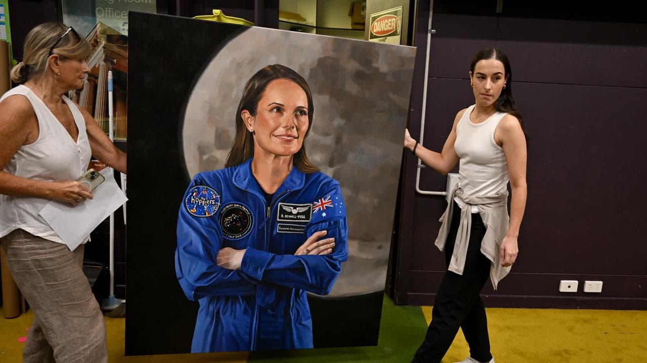 Artist Peta Minnici carries her entry