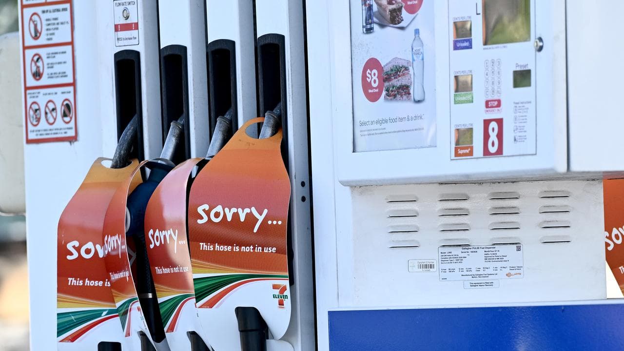 A close-up of petrol pumps at an Australian service station.