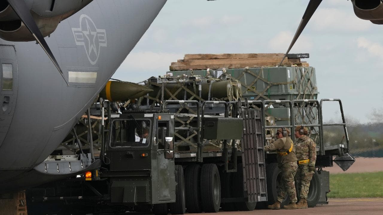 Munitions are unloaded from a cargo plane at RAF Fairford, England