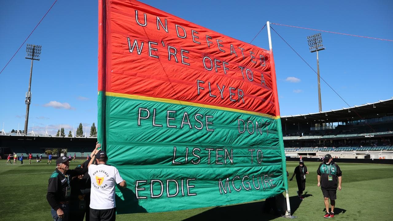 The Devils' banner took a gentle dig at Eddie McGuire.