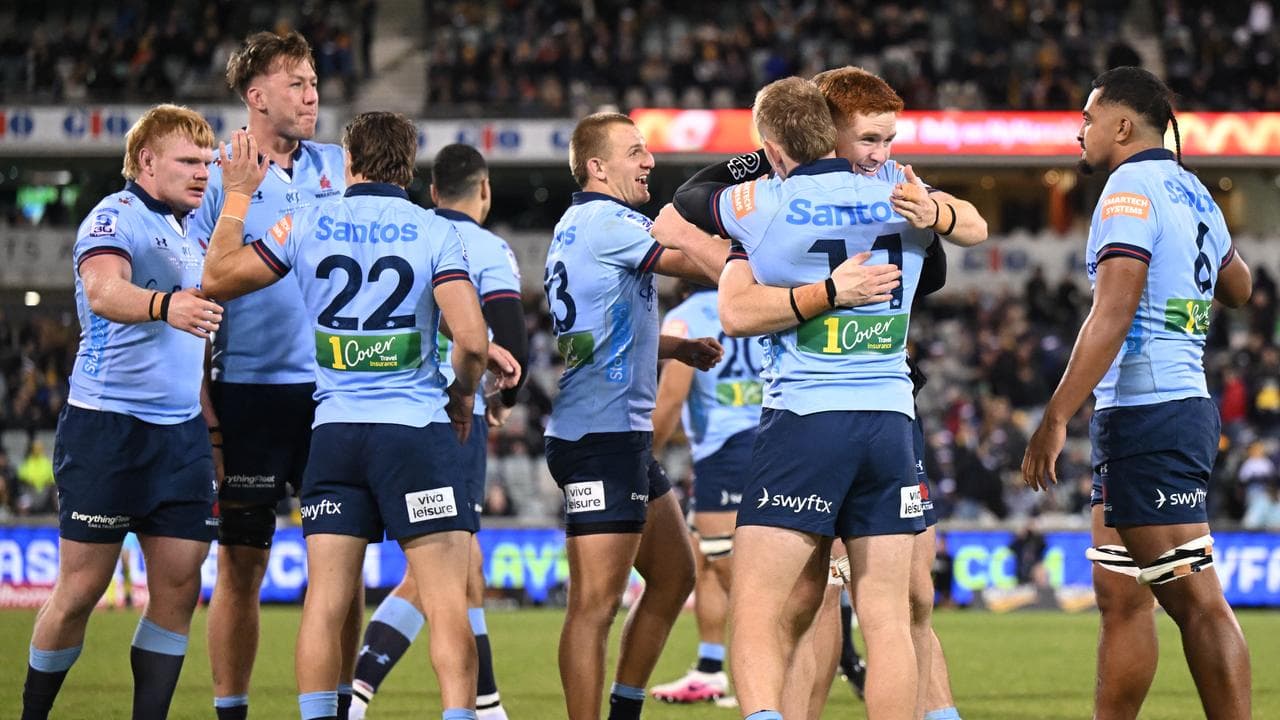 Celebrating NSW Waratahs players.