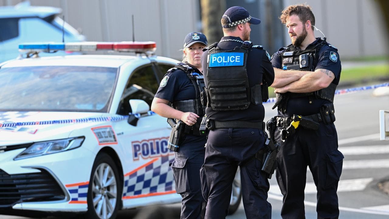 Police officers are seen at the scene of the shooting