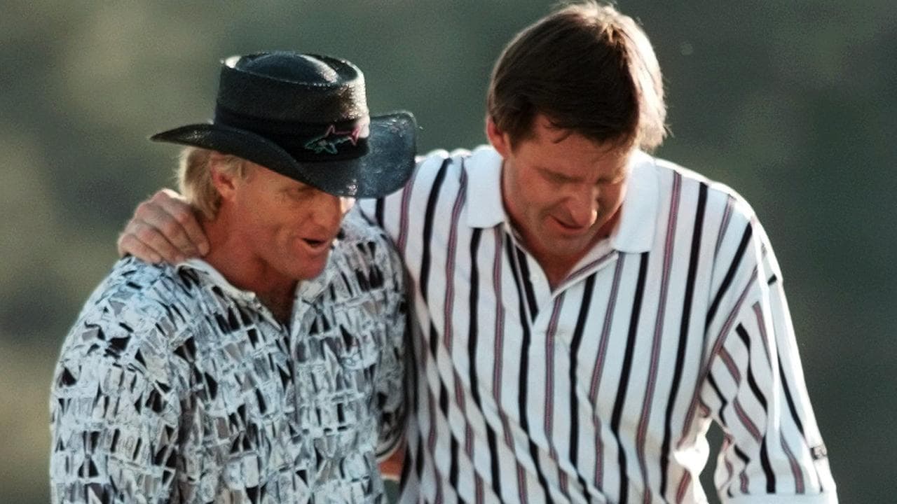 (L-R) Greg Norman and Nick Faldo.