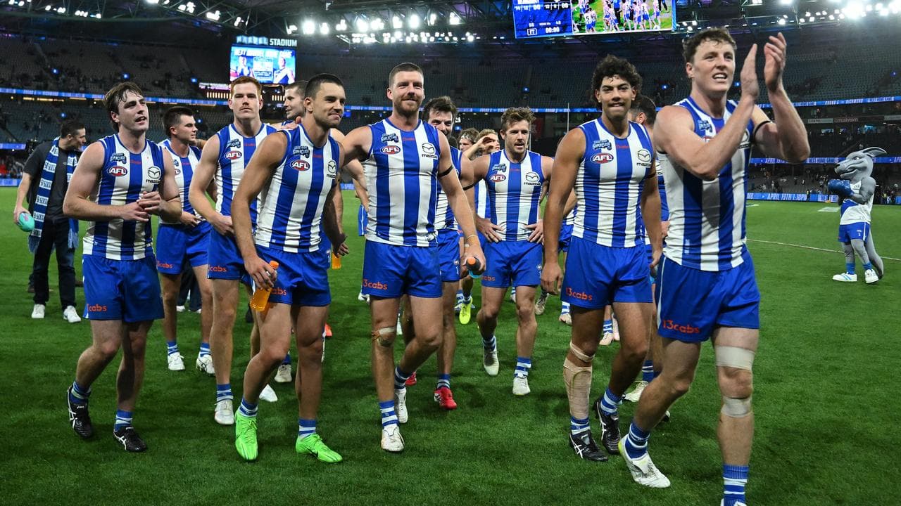 Celebrating North Melbourne players.