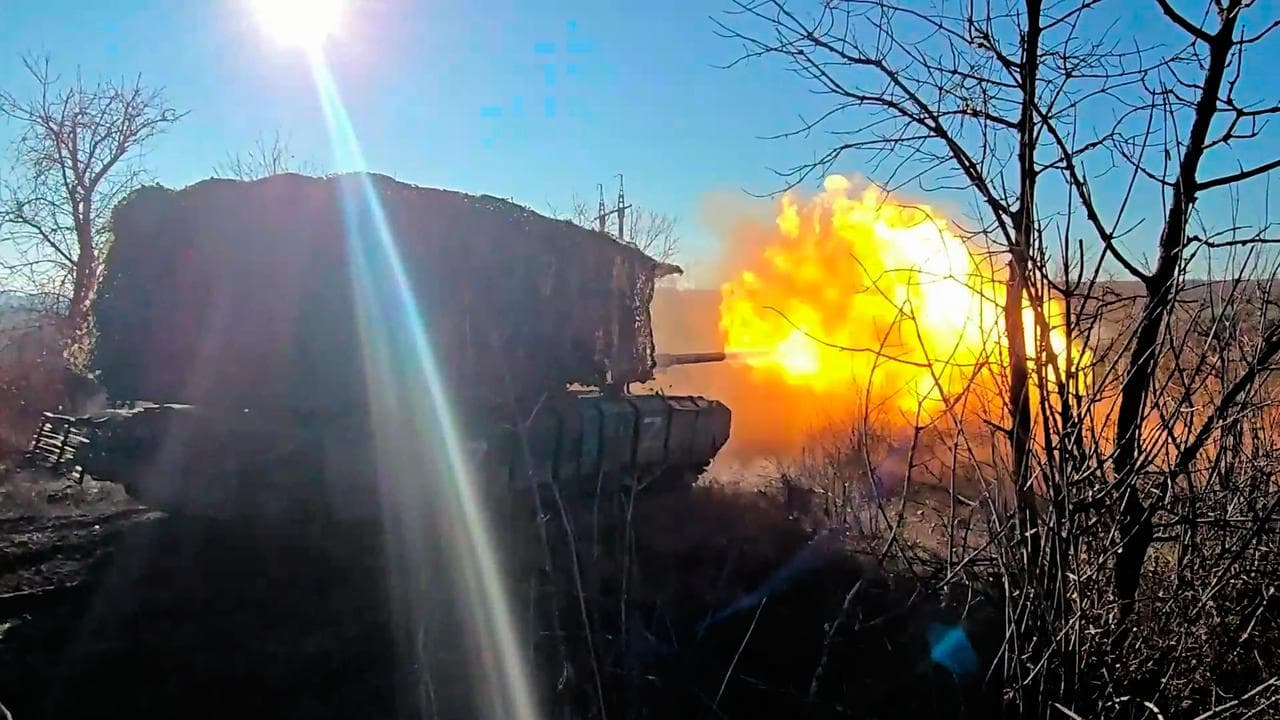 A Russian tank fires at a Ukrainian position