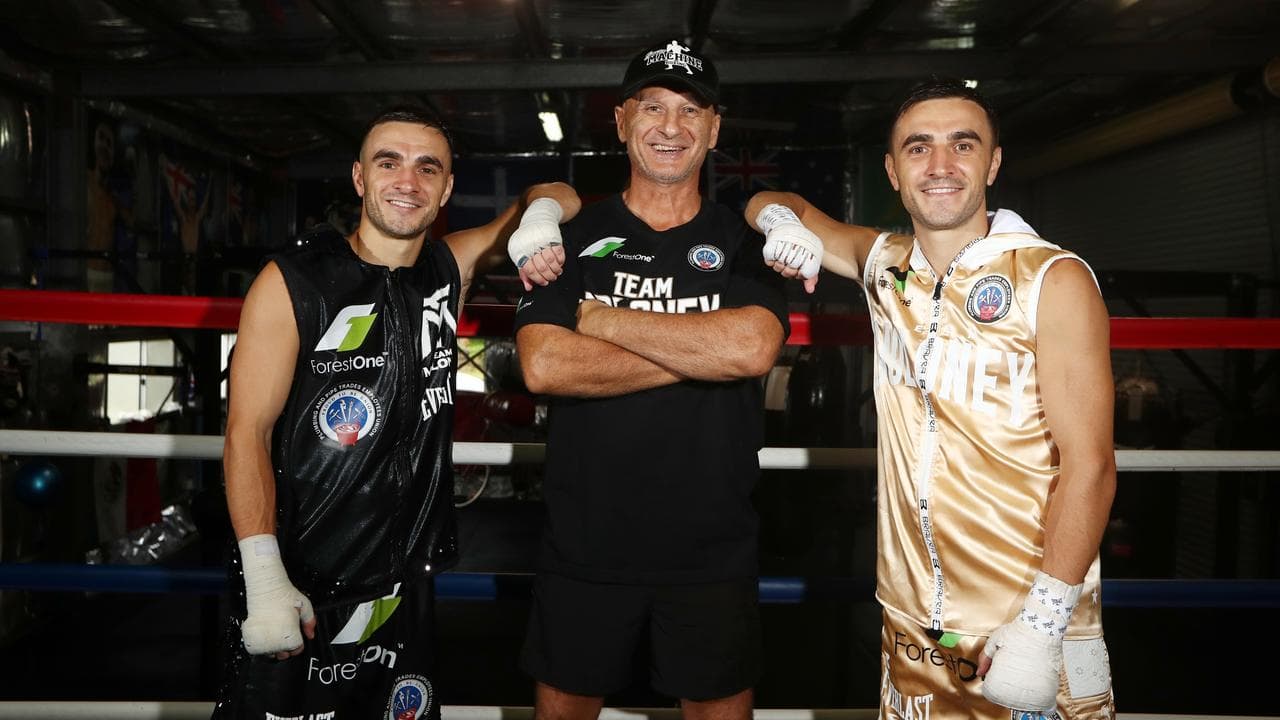 Angelo Hyder flanked by boxing brothers Andrew and Jason Moloney.
