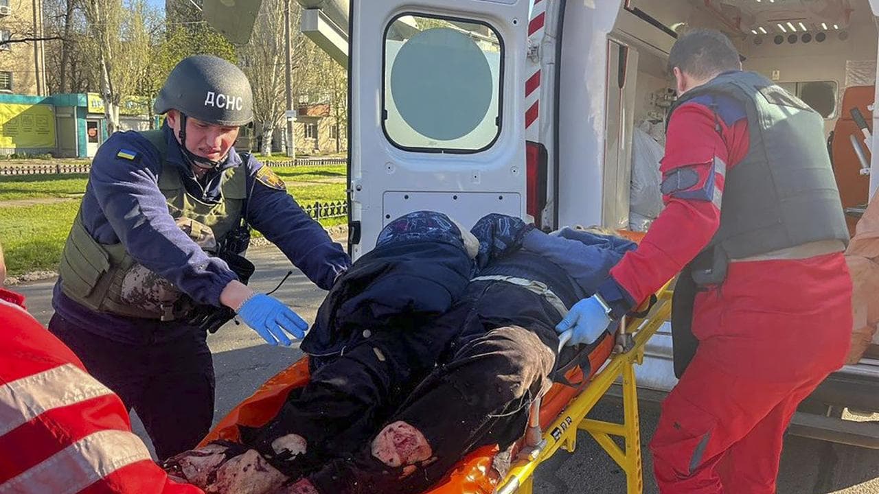 Paramedics after a Russian strike on a bus in Nikopol, Ukraine