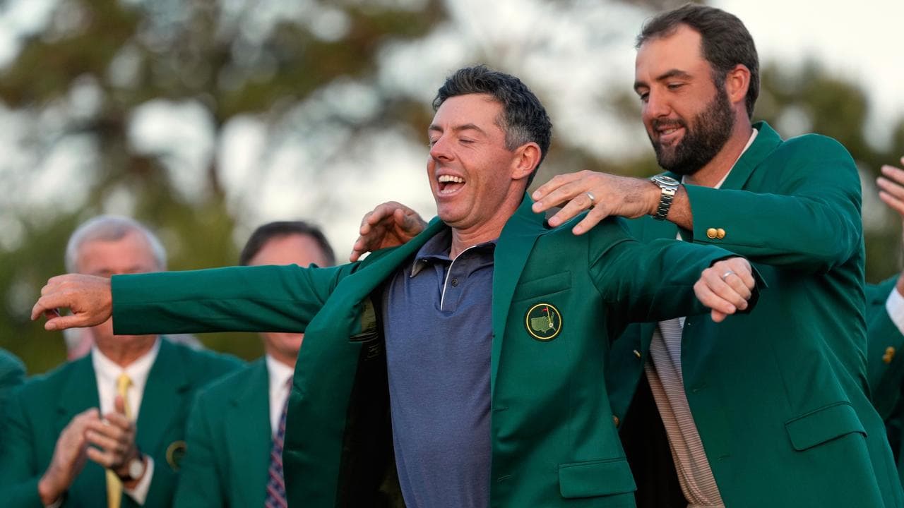 Scottie Scheffler and Rory McIlroy.