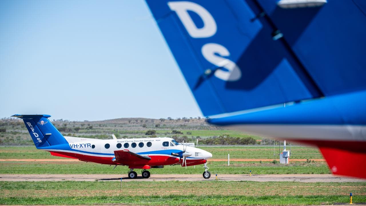 A Royal Flying Doctor Service aircraft returns to Broken Hill Airport