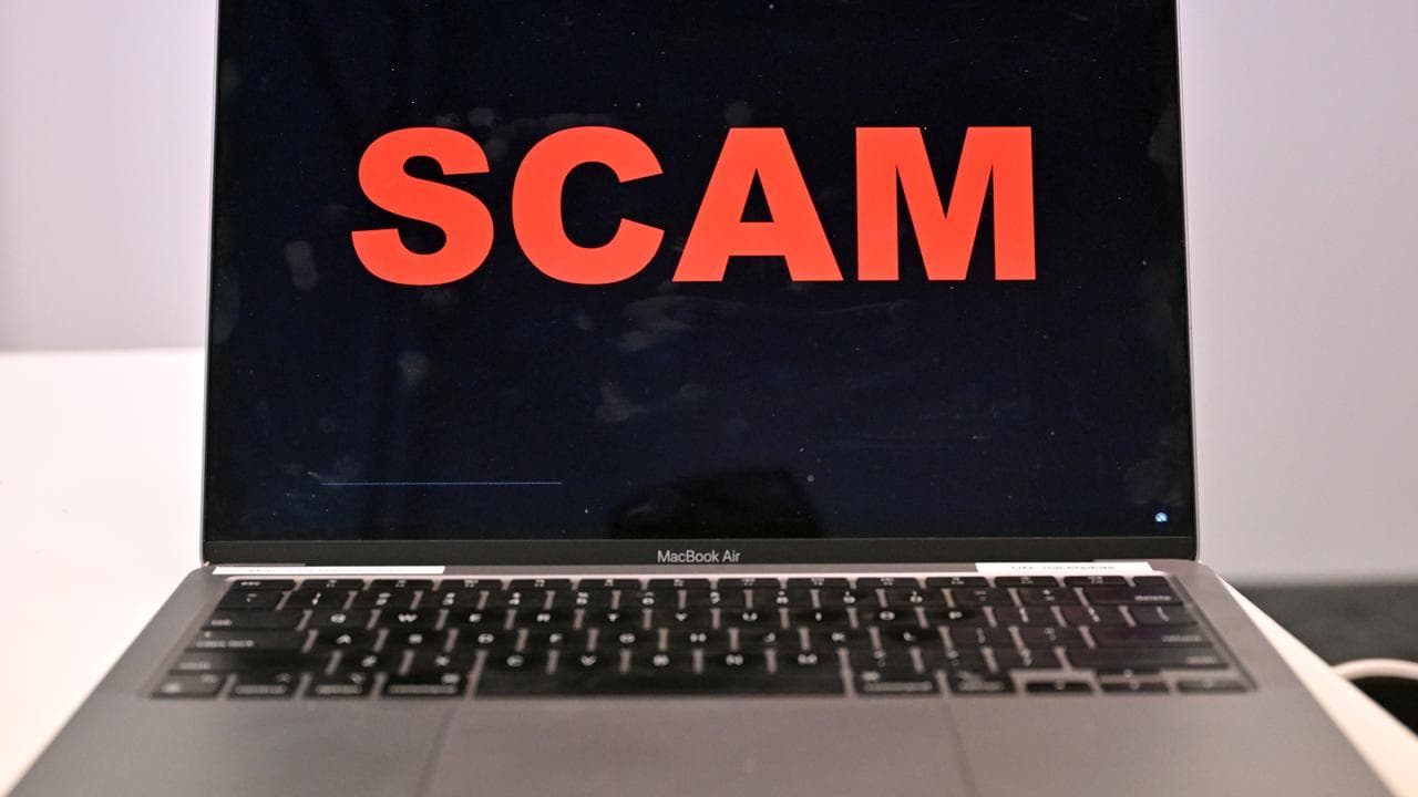 The word scam on a laptop (file image)