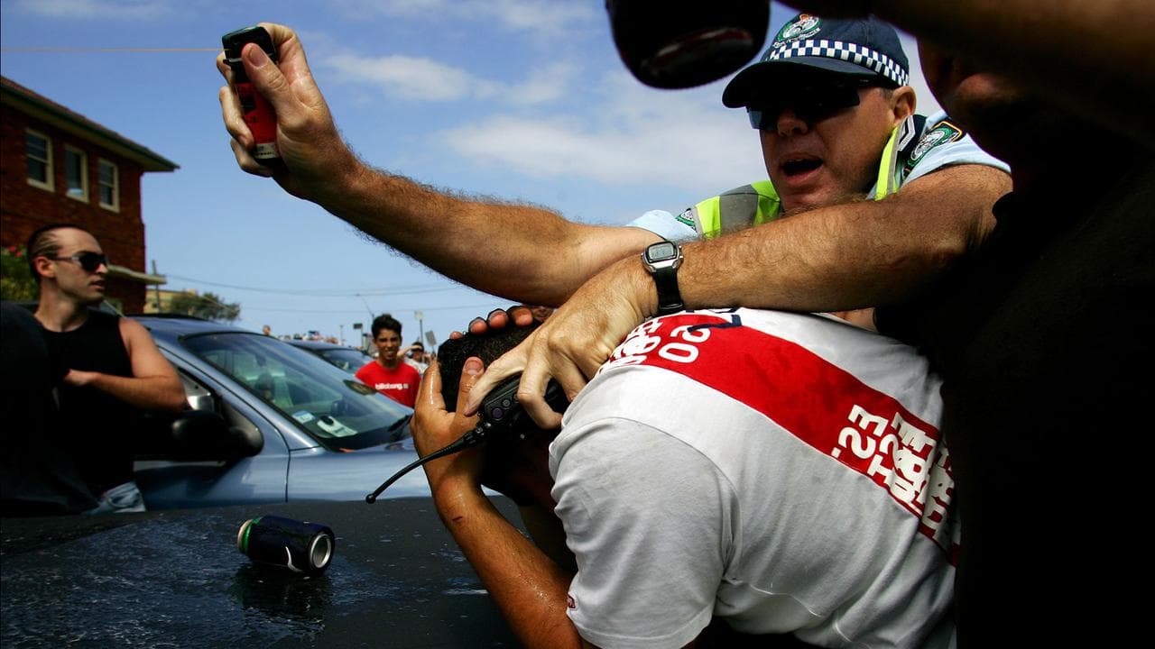Cop defends man during Cronulla riots (file)