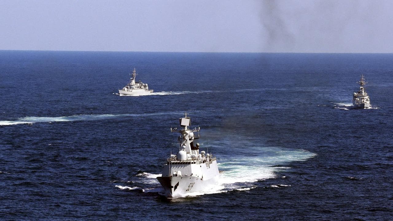 Chinese navy vessels take part in a drill