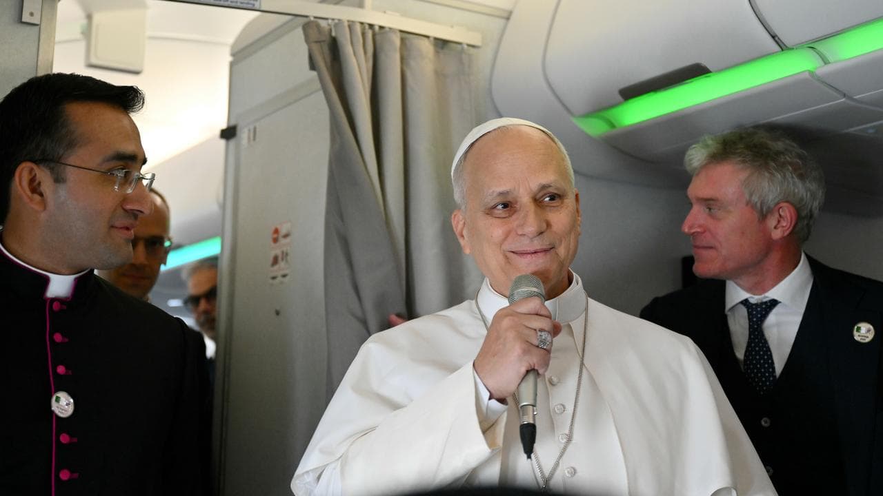 Pope Leo XIV speaks to journalists aboard his flight bound for Algiers