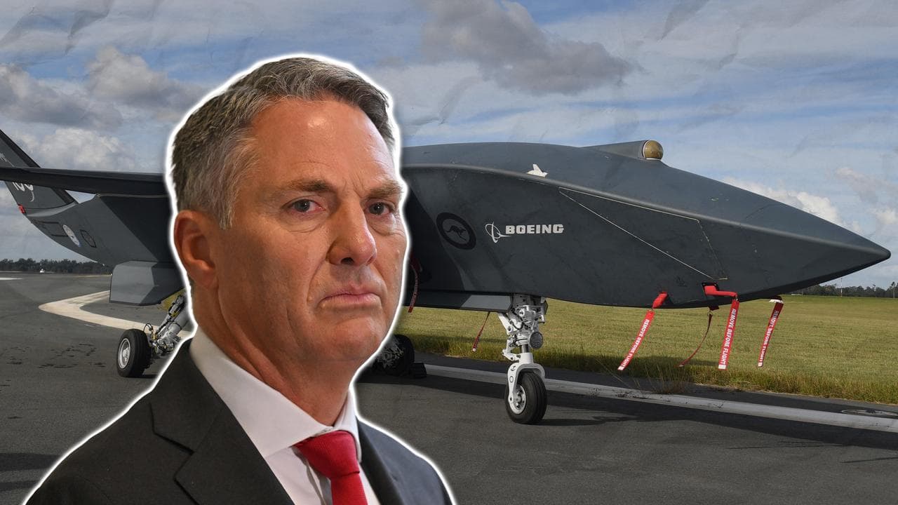 Defence Minister Richard Marles and a Ghost Bat drone (file images)