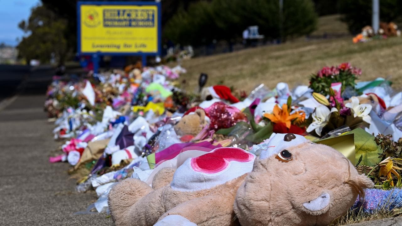 Flowers, soft toys and tributes outside the school (file)