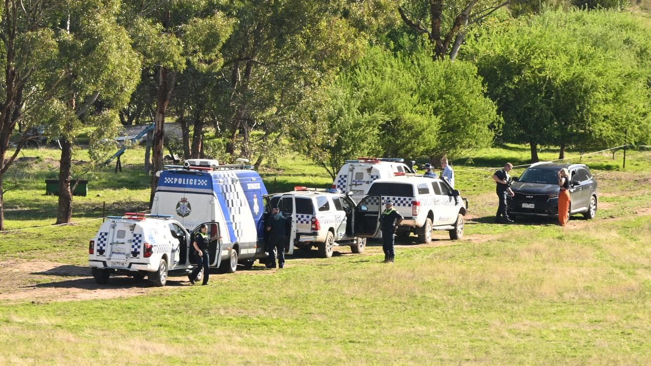 Police attend the scene where fugitive Dezi Freeman was shot dead.