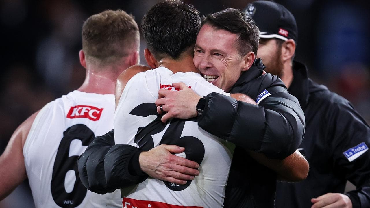 Craig McRae and Nick Daicos.