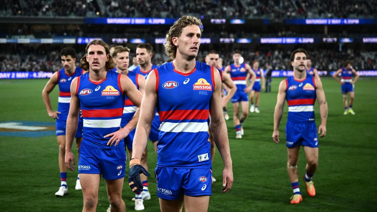Disappointed Western Bulldogs players.