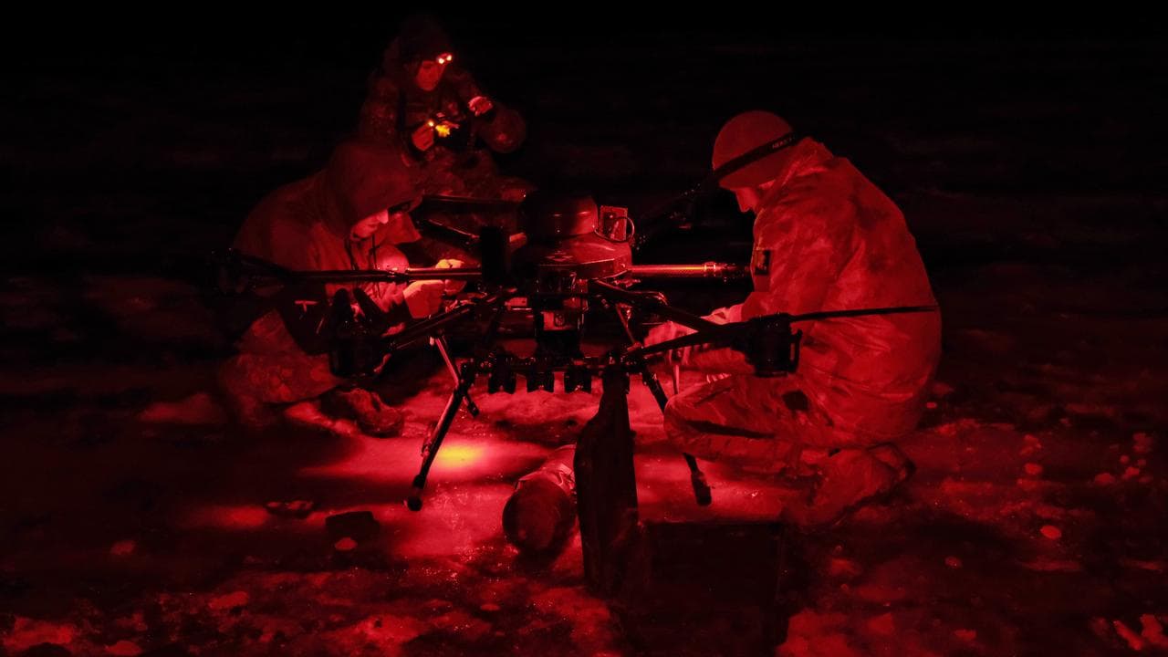 A Ukrainian team attaches a bomb to a drone (file image)