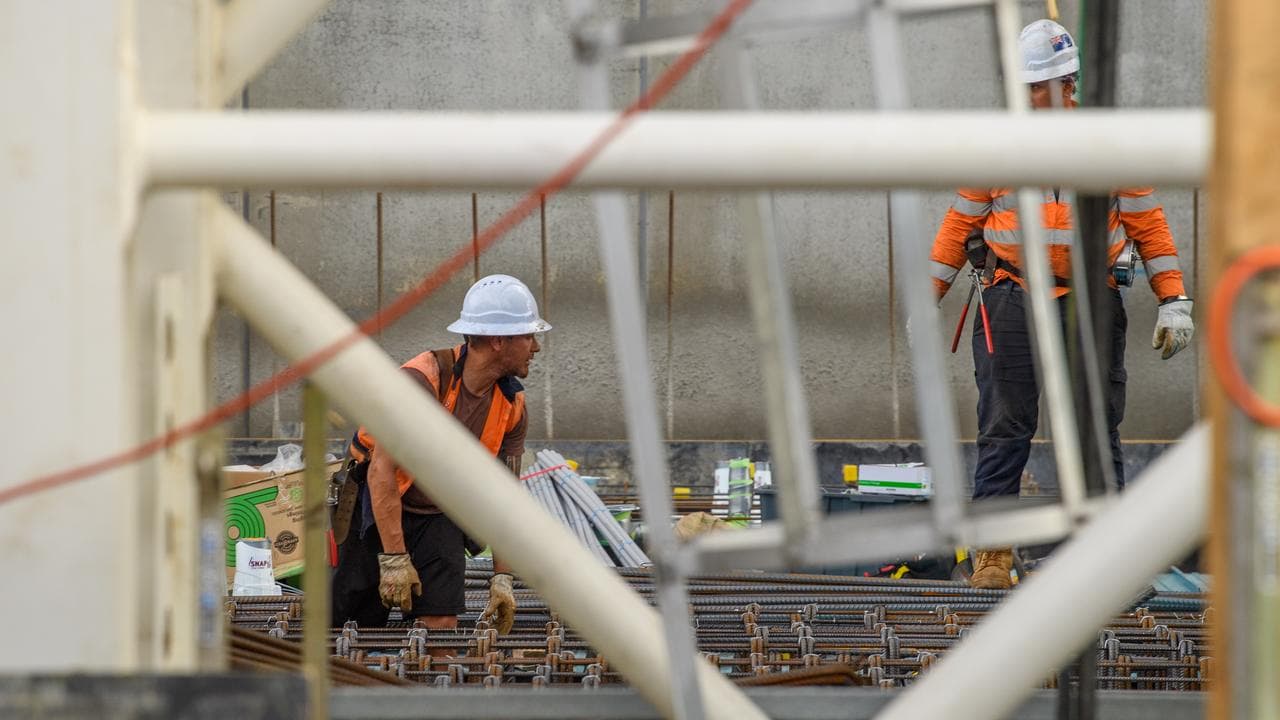 A construction worker works on steel reinforcing (file image)