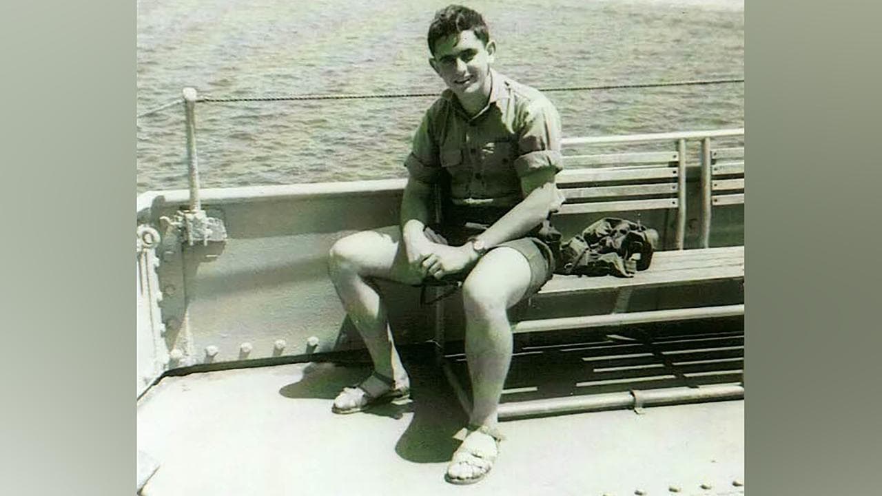 Young David Manolas in the navy