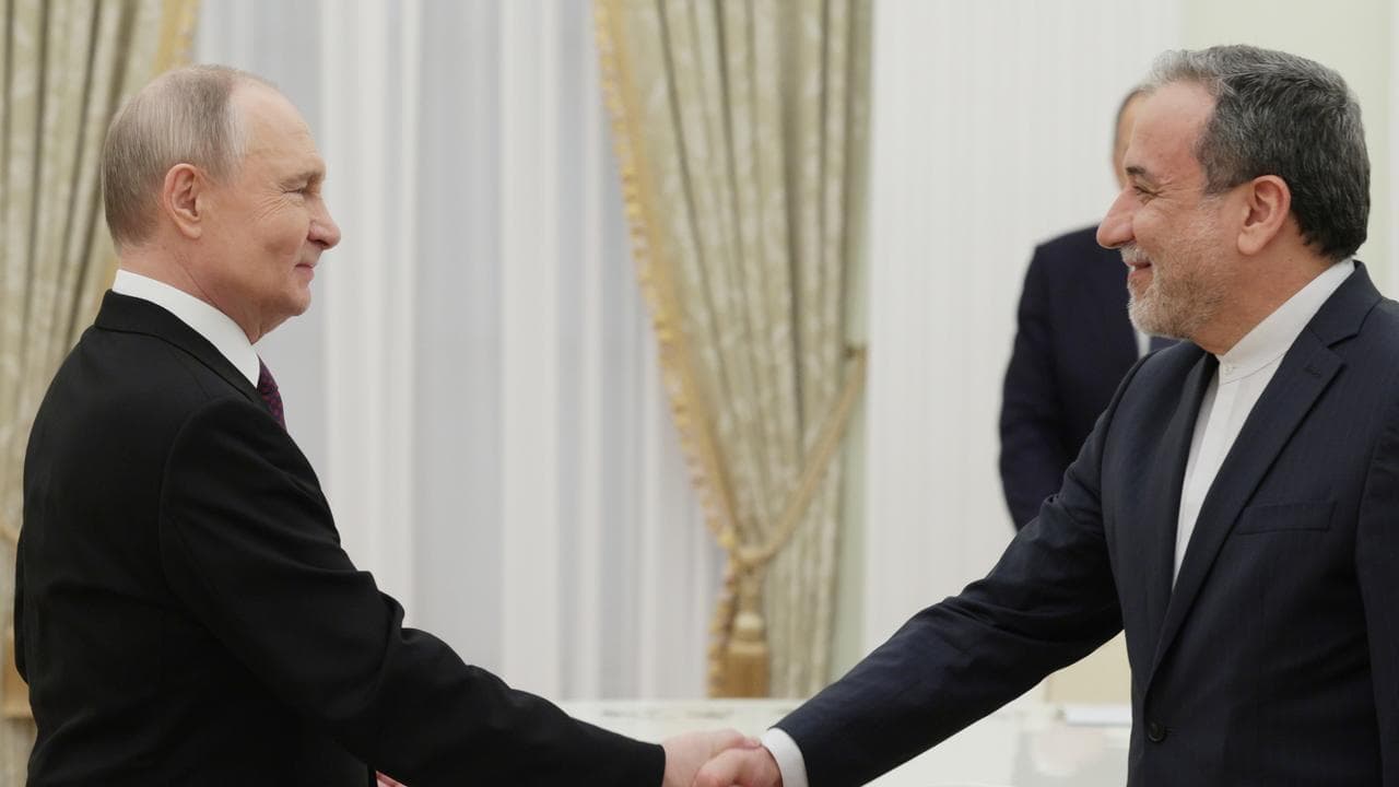 President Vladimir Putin and Foreign Minister Seyed Abbas Araghchi