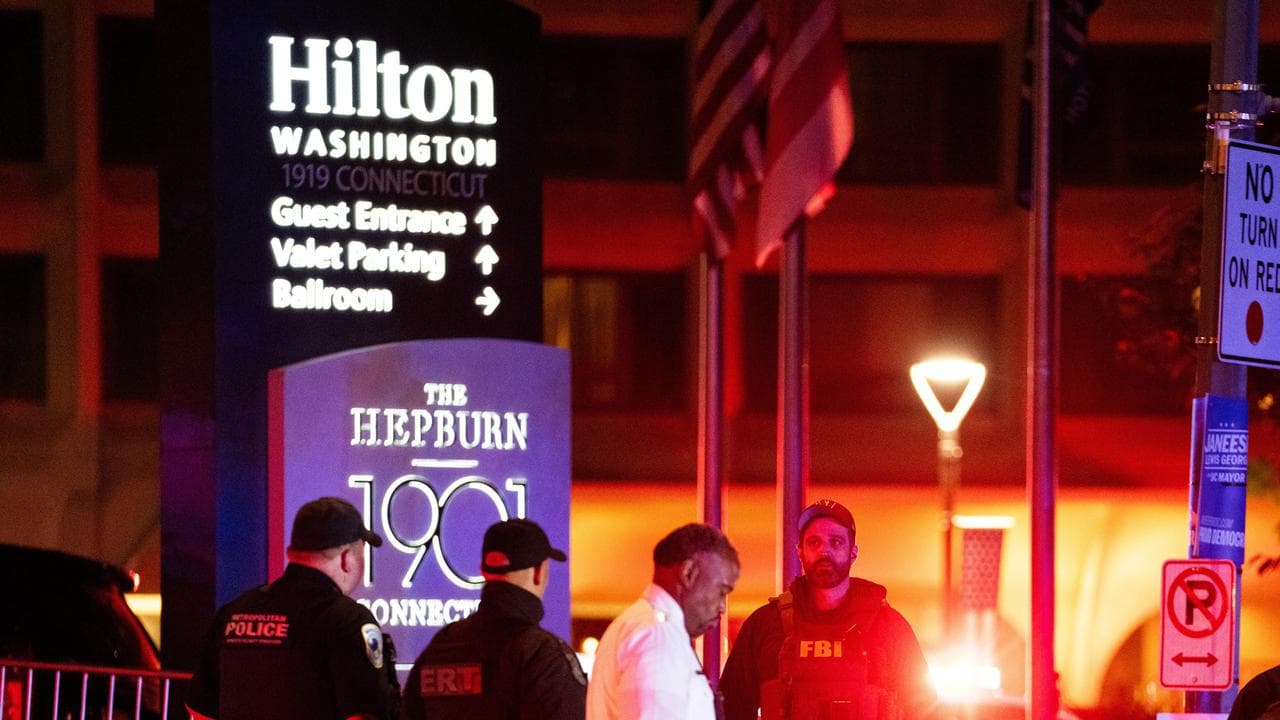 Police after an incident at the White House Correspondents Dinner