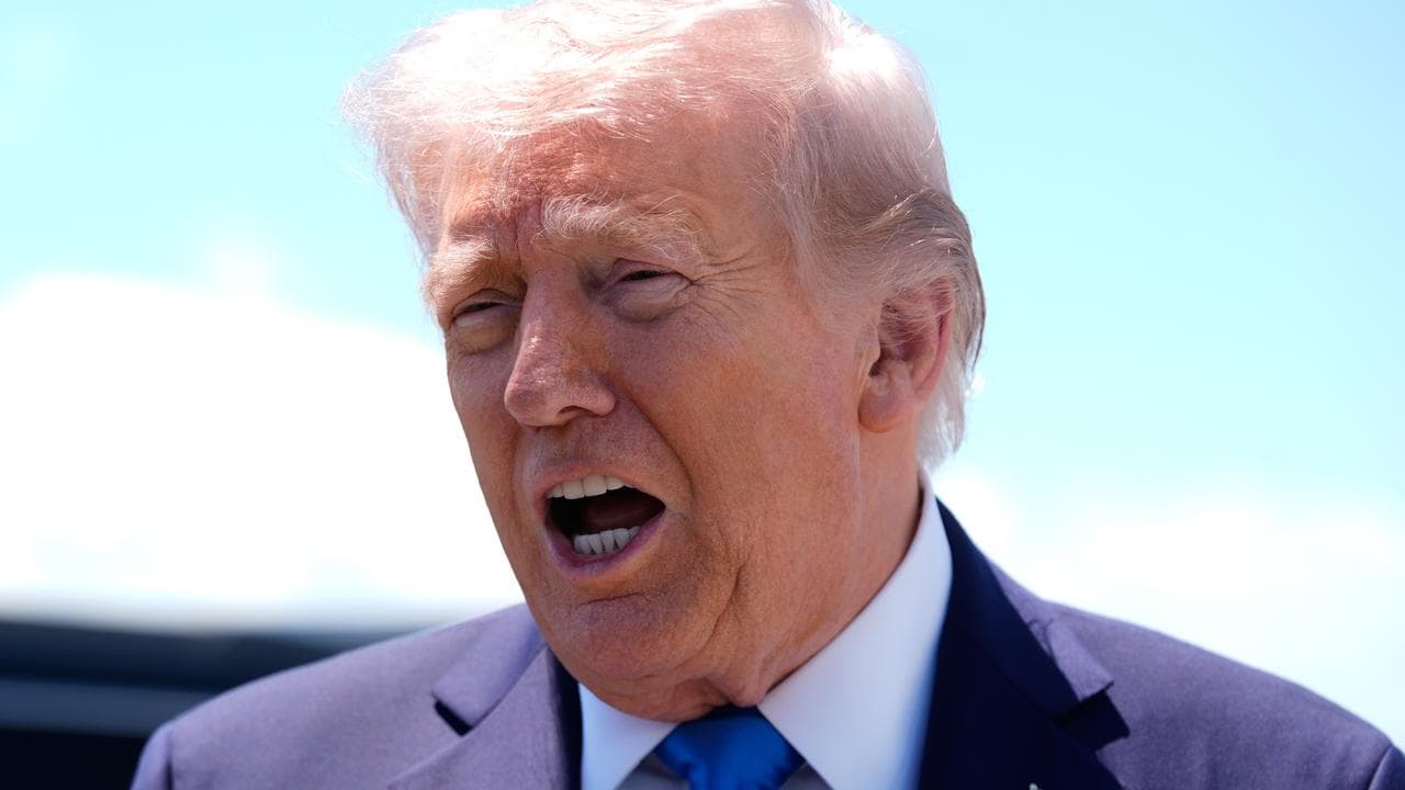 US President Donald Trump speaks to reporters