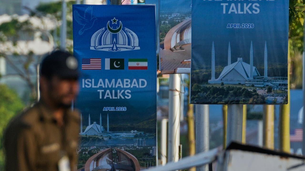 Posters near a possible venue for US-Iran talks in Islamabad, Pakistan