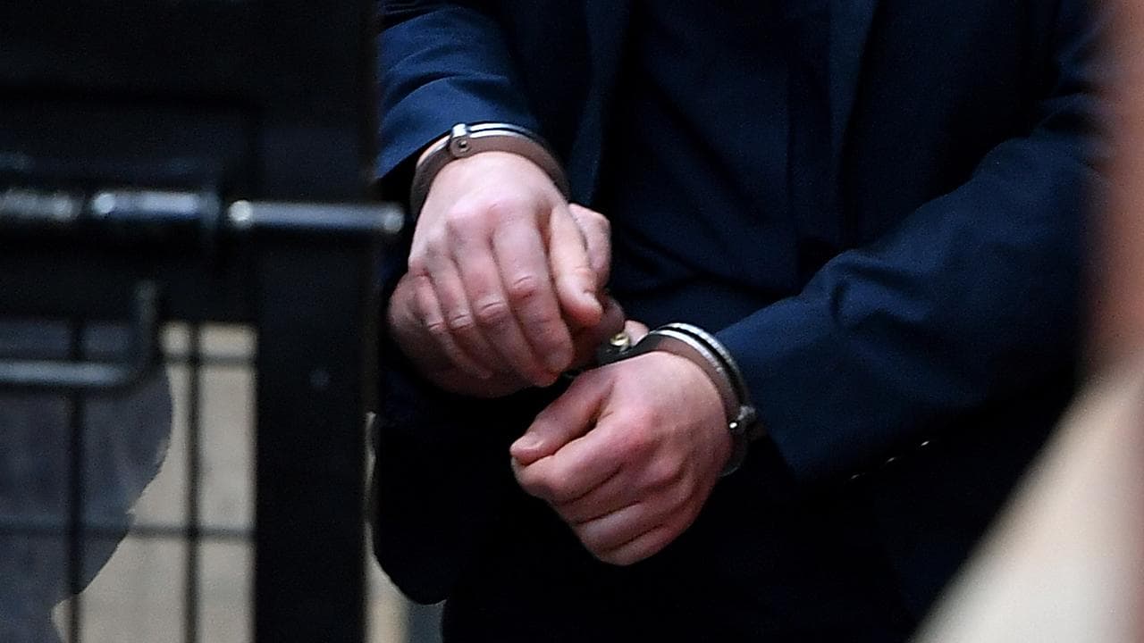 Woman in handcuffs (file)