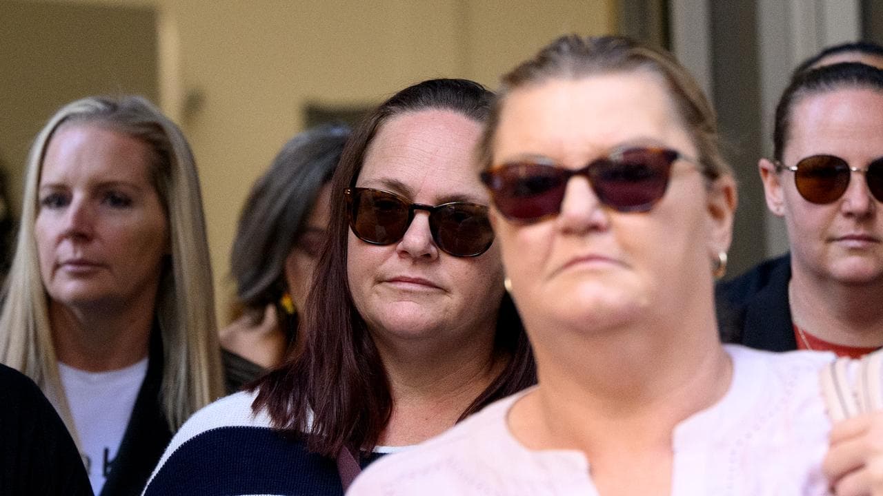Samantha Hooker departs New South Wales Supreme Court with supporters.