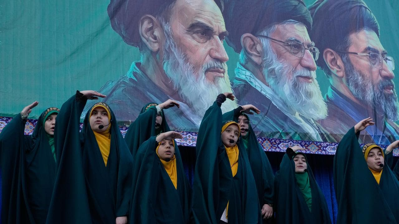 Iranians rally in support of the new supreme leader in Tehran