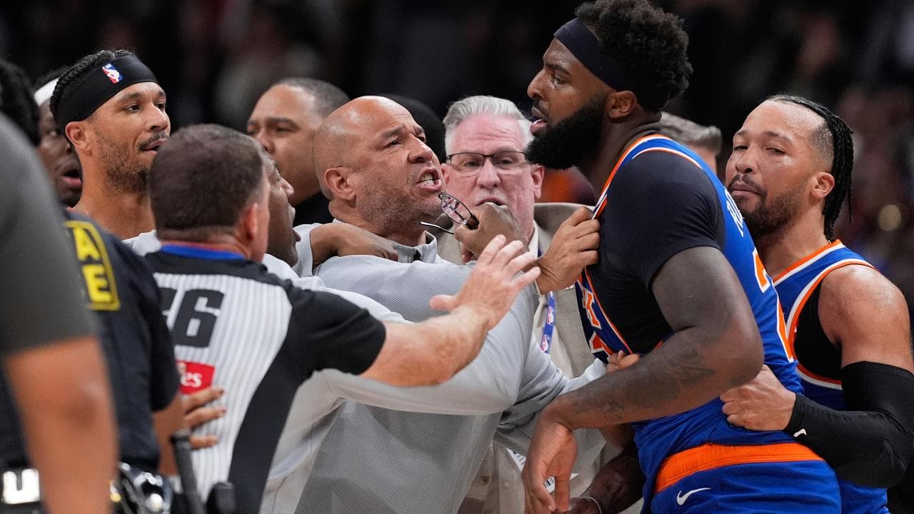 Dyson Daniels and Mitchell Robinson both ejected from the game.