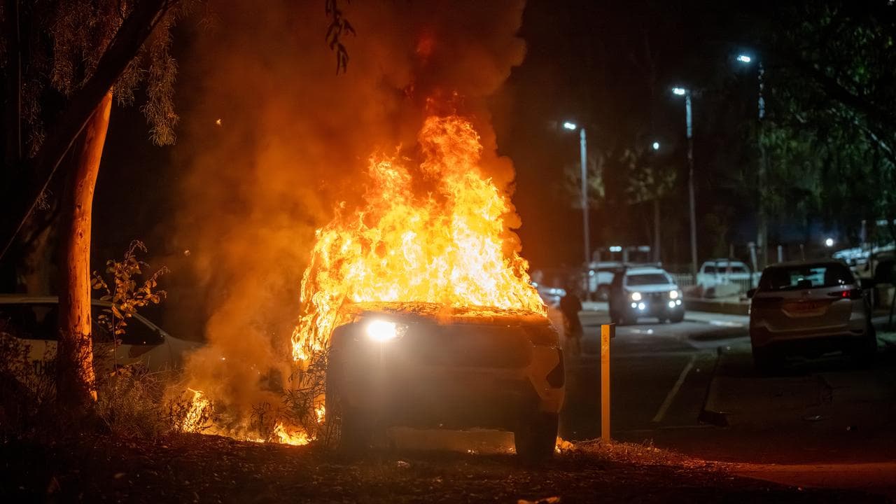 A police vehicle is set alight