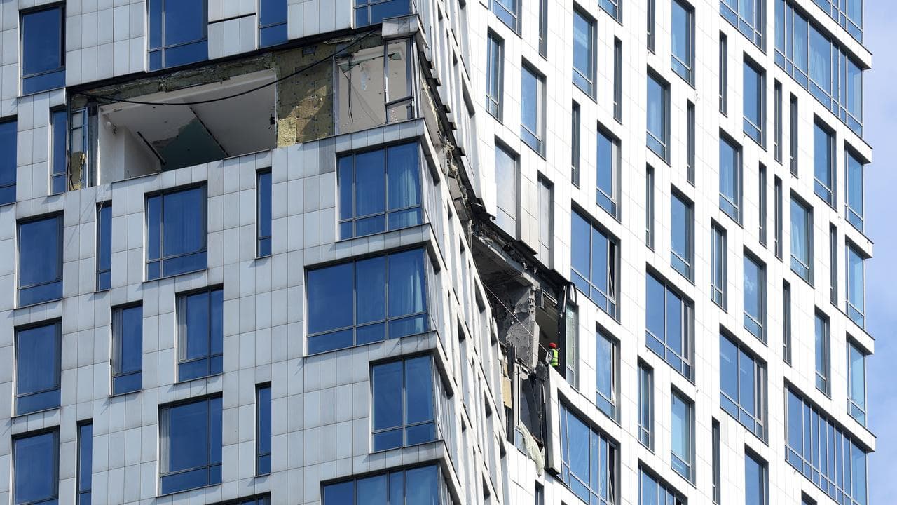 A damaged apartment building after a Ukrainian drone strike in Moscow