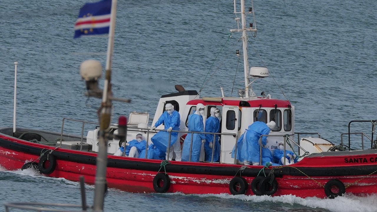 Health workers arrive to evacuate patients from MV Hondius