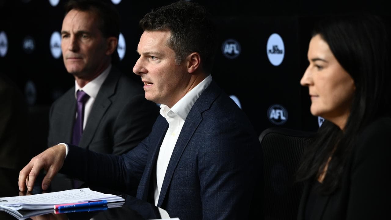 AFLPA chief executive James Gallagher (centre)