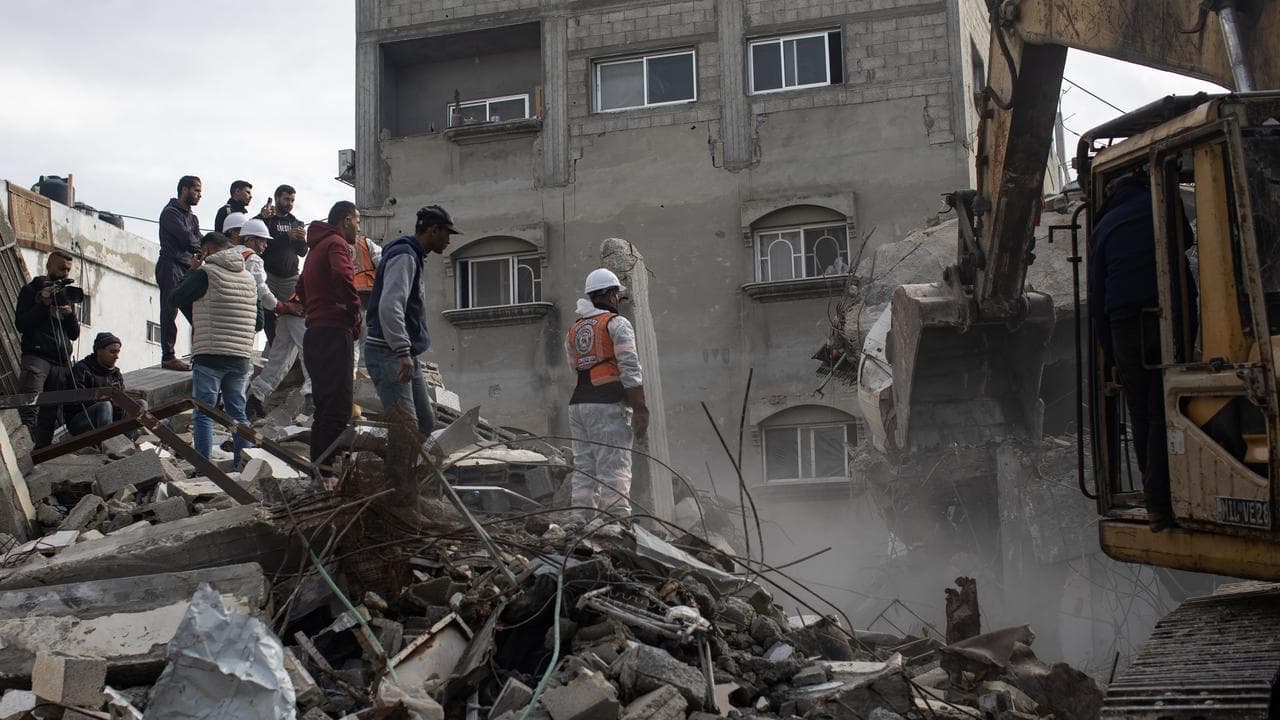 Palestinian Civil Defense teams